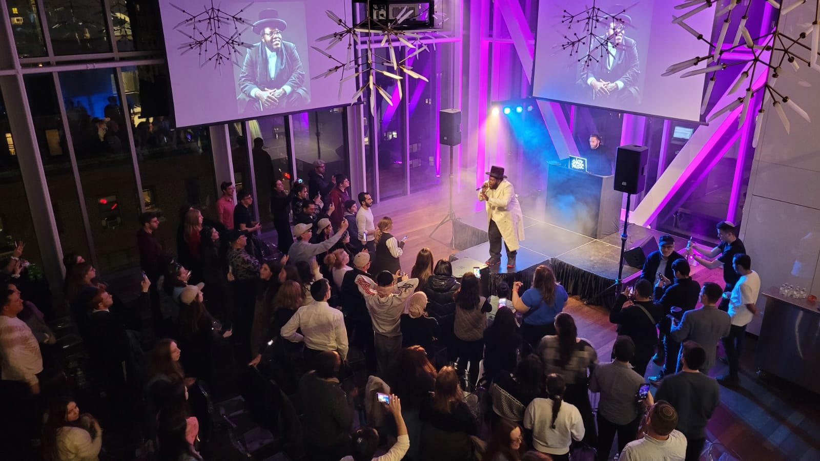 Singer Nissim Black performing at private event